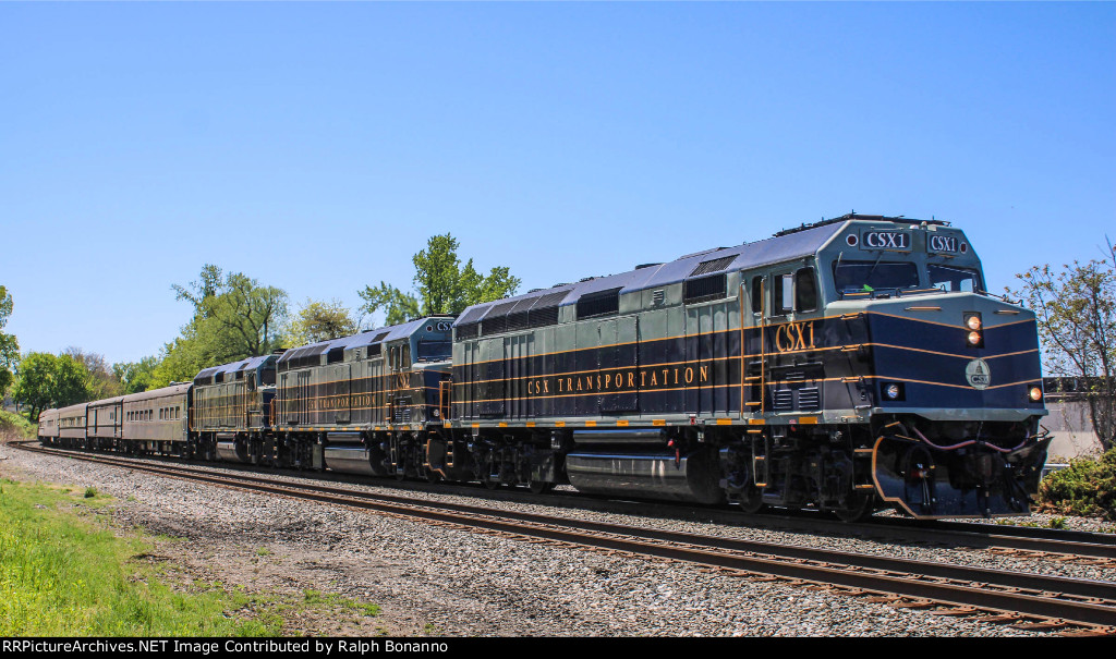 CSX business train P001-09 northbound past the station on a sunny Tuesday morning 